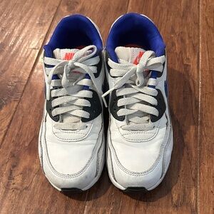 Nike Kids White and Black Sneakers with Blue Accents